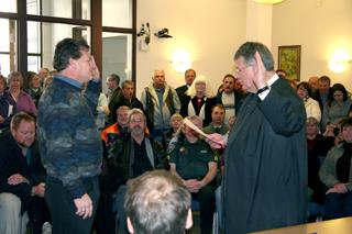 Scott Aibner, county surveyor, takes the oath of office